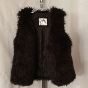 Justice black faux fur vest